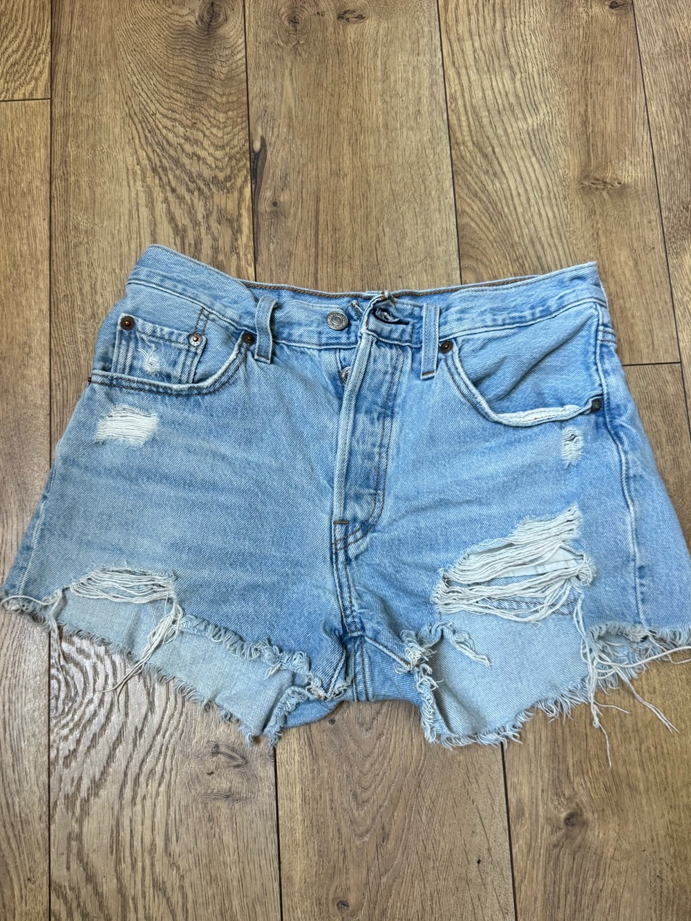 Levi’s 501 button fly Light Blue Distressed Denim Shorts